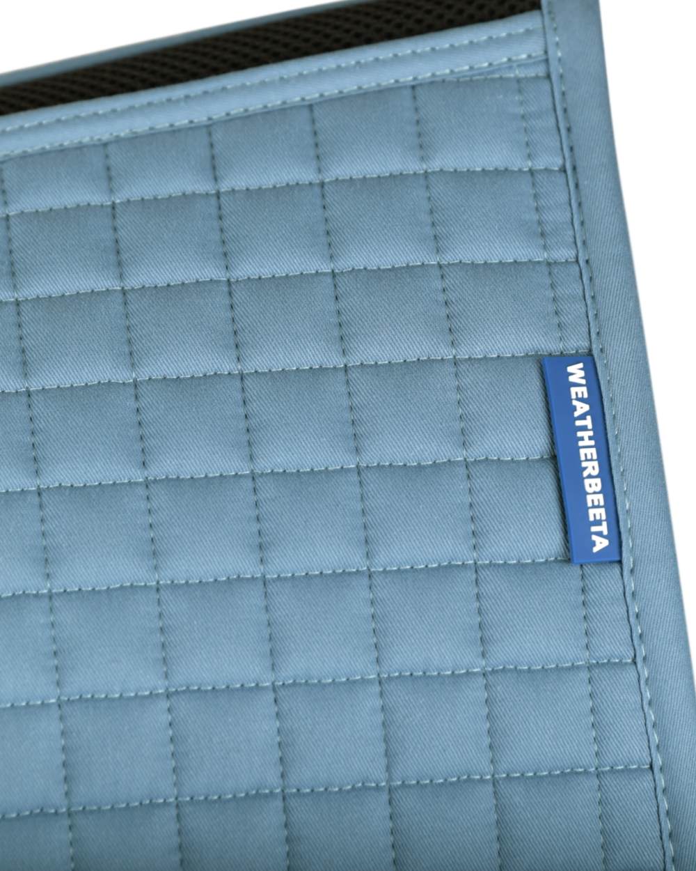Washed Denim Coloured WeatherBeeta Prime Air-Tec Dressage Saddle Pad on white background 