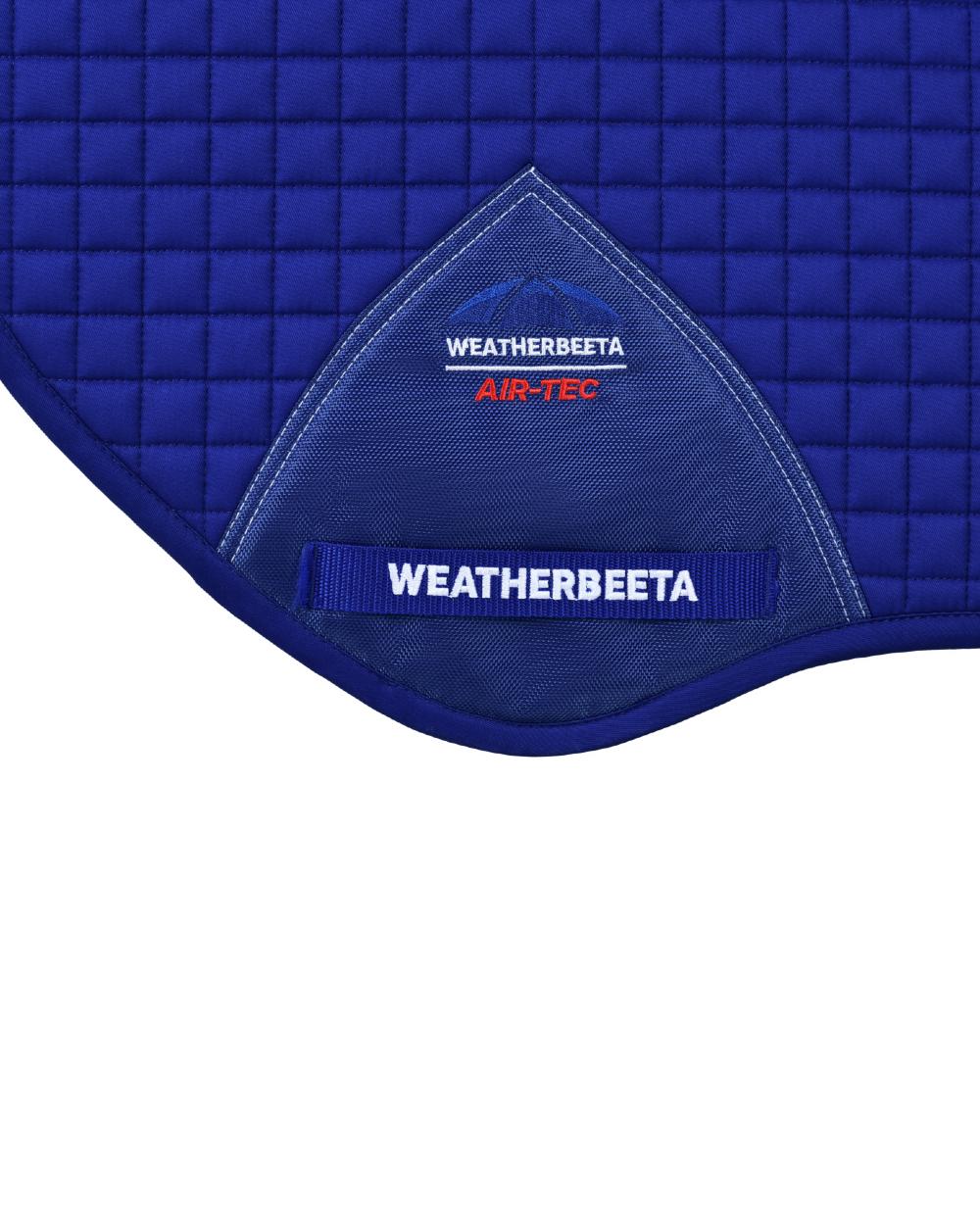 Cobalt Coloured WeatherBeeta Prime Air-Tec Jump Shaped Saddle Pad on white background 