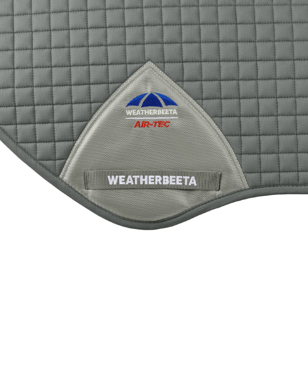 Grey Coloured WeatherBeeta Prime Air-Tec Jump Shaped Saddle Pad on white background 