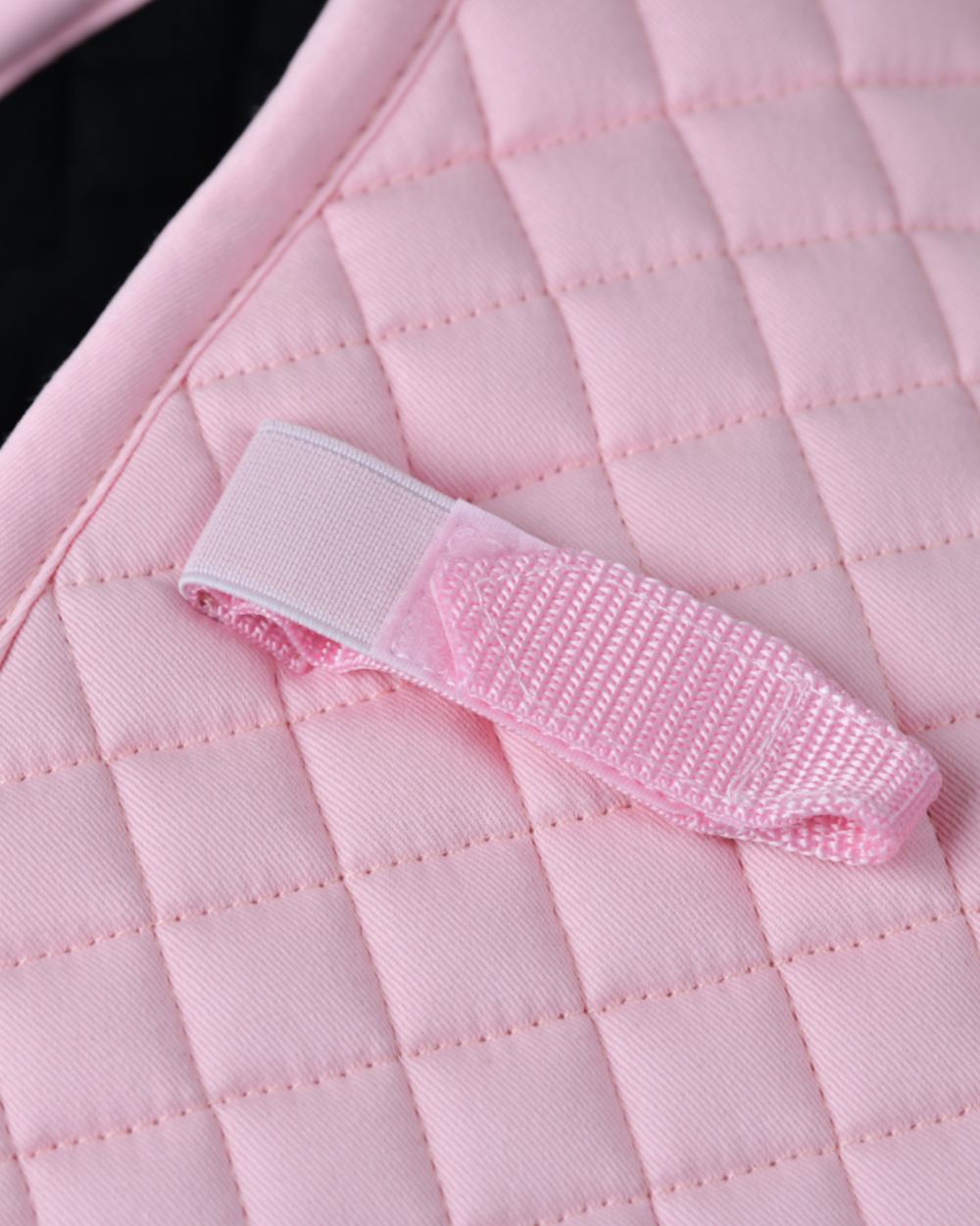 Light Pink Coloured WeatherBeeta Prime Air-Tec Jump Shaped Saddle Pad on white background 