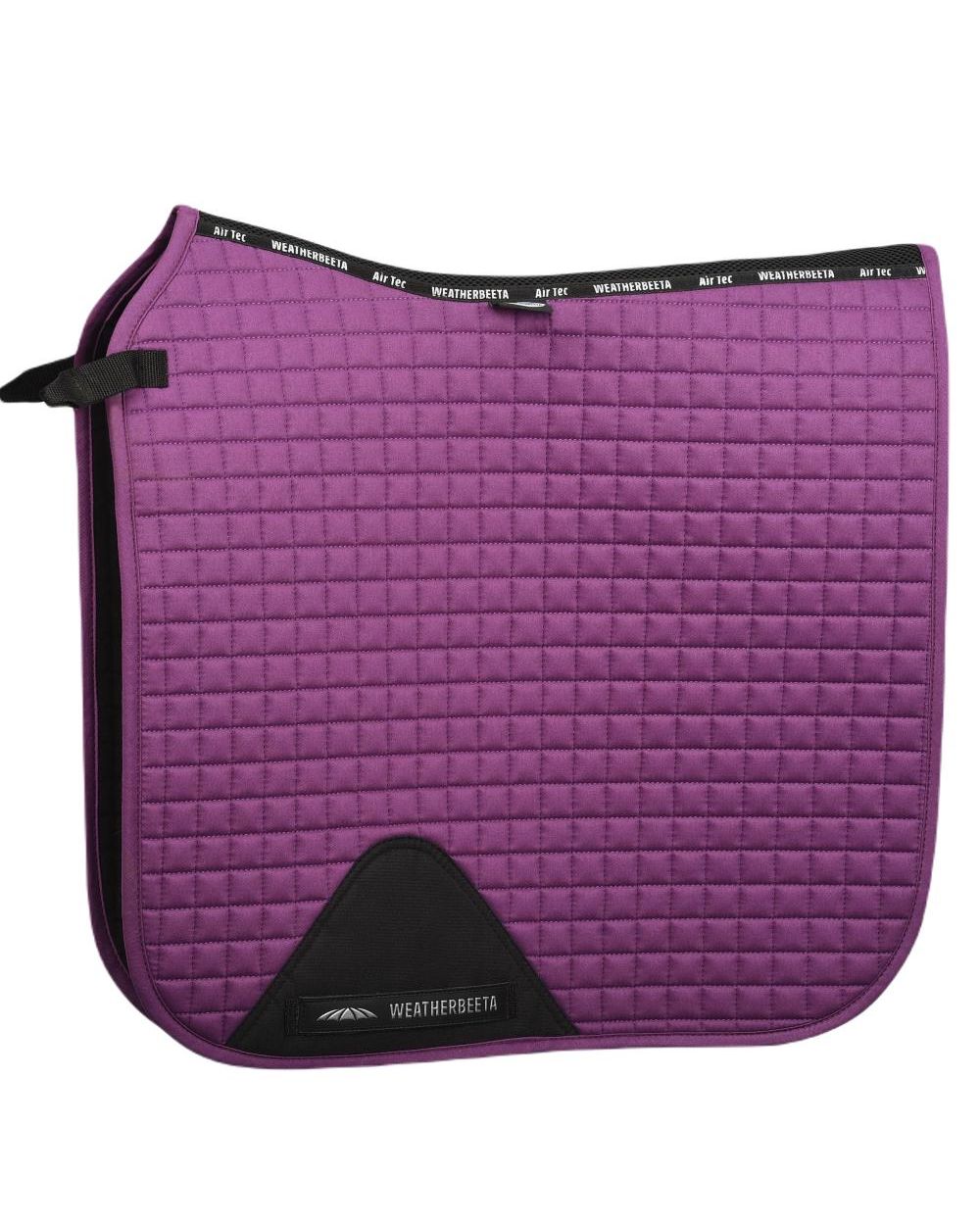 Violet coloured WeatherBeeta Prime Dressage Saddle Pad on white background 