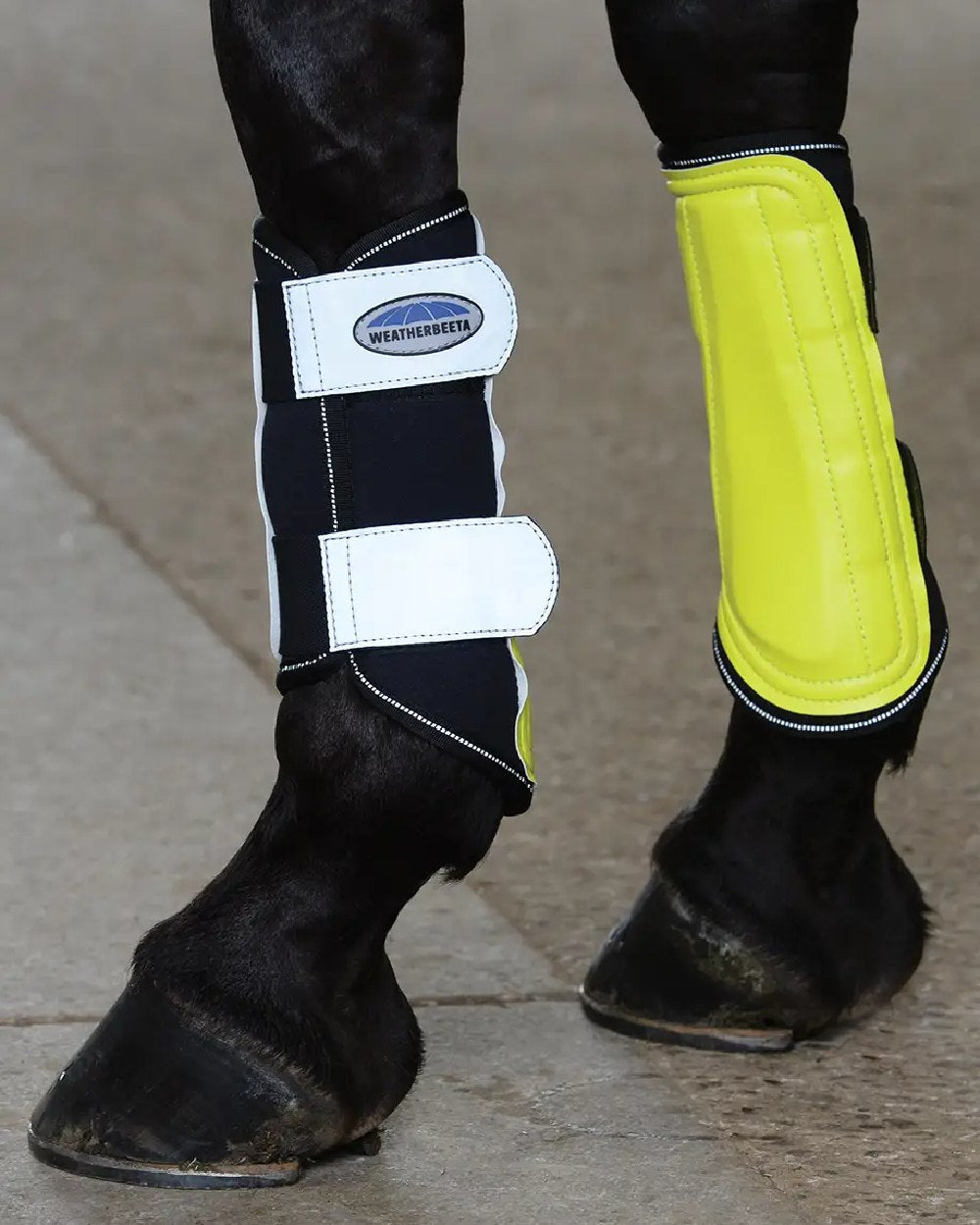 Yellow Silver coloured WeatherBeeta Reflective Single Lock Brushing Boots on blurry background 