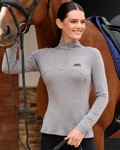Navy coloured WeatherBeeta Womens 37.5 Lightweight Performance Long Sleeve Quarter Zip Top on outdoor background 