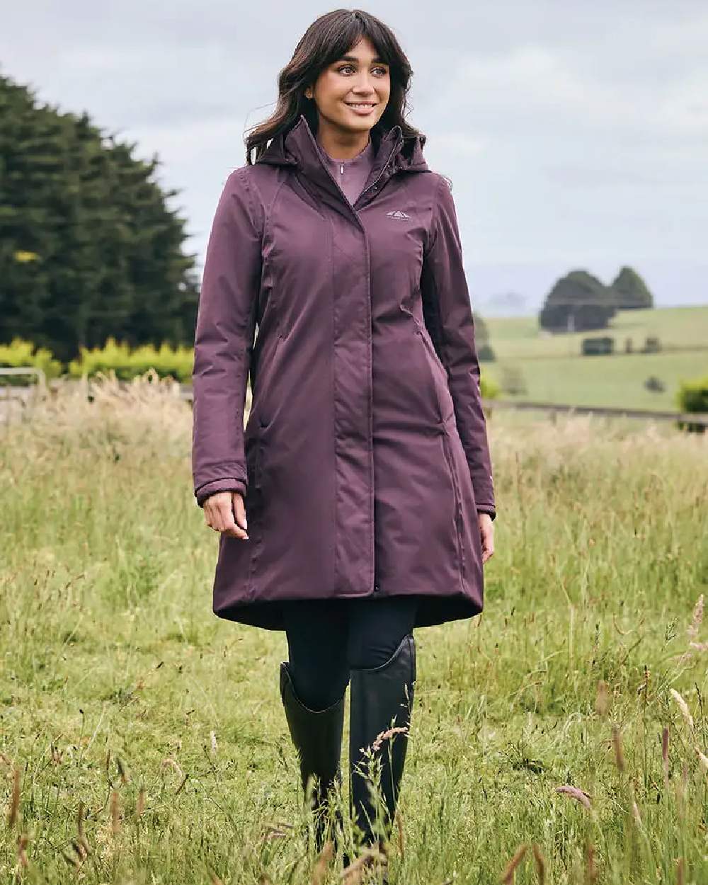Mulberry Coloured WeatherBeeta Womens All Purpose Waterproof Longline Equestrian Jacket on outdoor background 