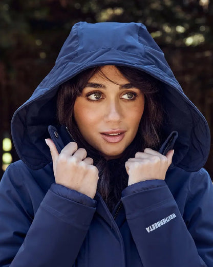 Navy Coloured WeatherBeeta Womens All Purpose Waterproof Longline Equestrian Jacket on outdoor background 