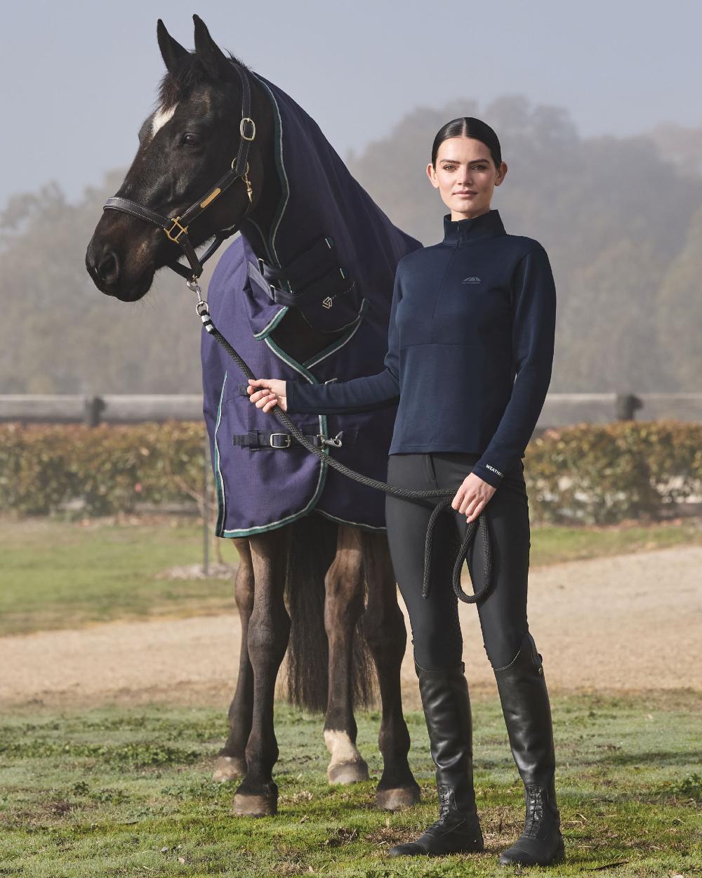 Navy Coloured WeatherBeeta Womens Copper Half Zip Long Sleeve Mid-Layer on outdoor background 