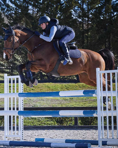 Navy Coloured WeatherBeeta Womens Insulated Vest on outdoor background 