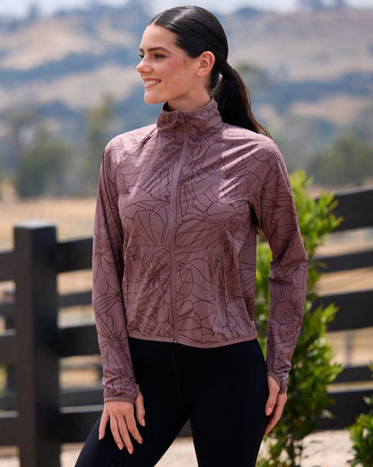 Mauve Wine coloured WeatherBeeta Womens Lightweight UV Jacket on outdoor background 