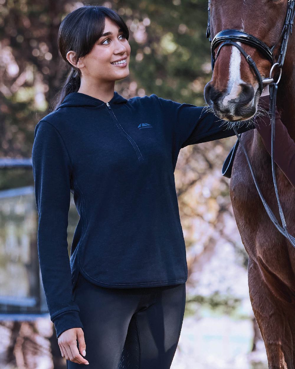 Dark Navy Marle Coloured WeatherBeeta Womens London Layer Long Sleeve Top With Hood on outdoor background 