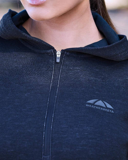 Dark Navy Marle Coloured WeatherBeeta Womens London Layer Long Sleeve Top With Hood on outdoor background 