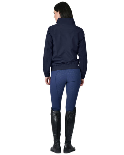 Navy coloured WeatherBeeta Womens Waterproof Team Jacket on white background 