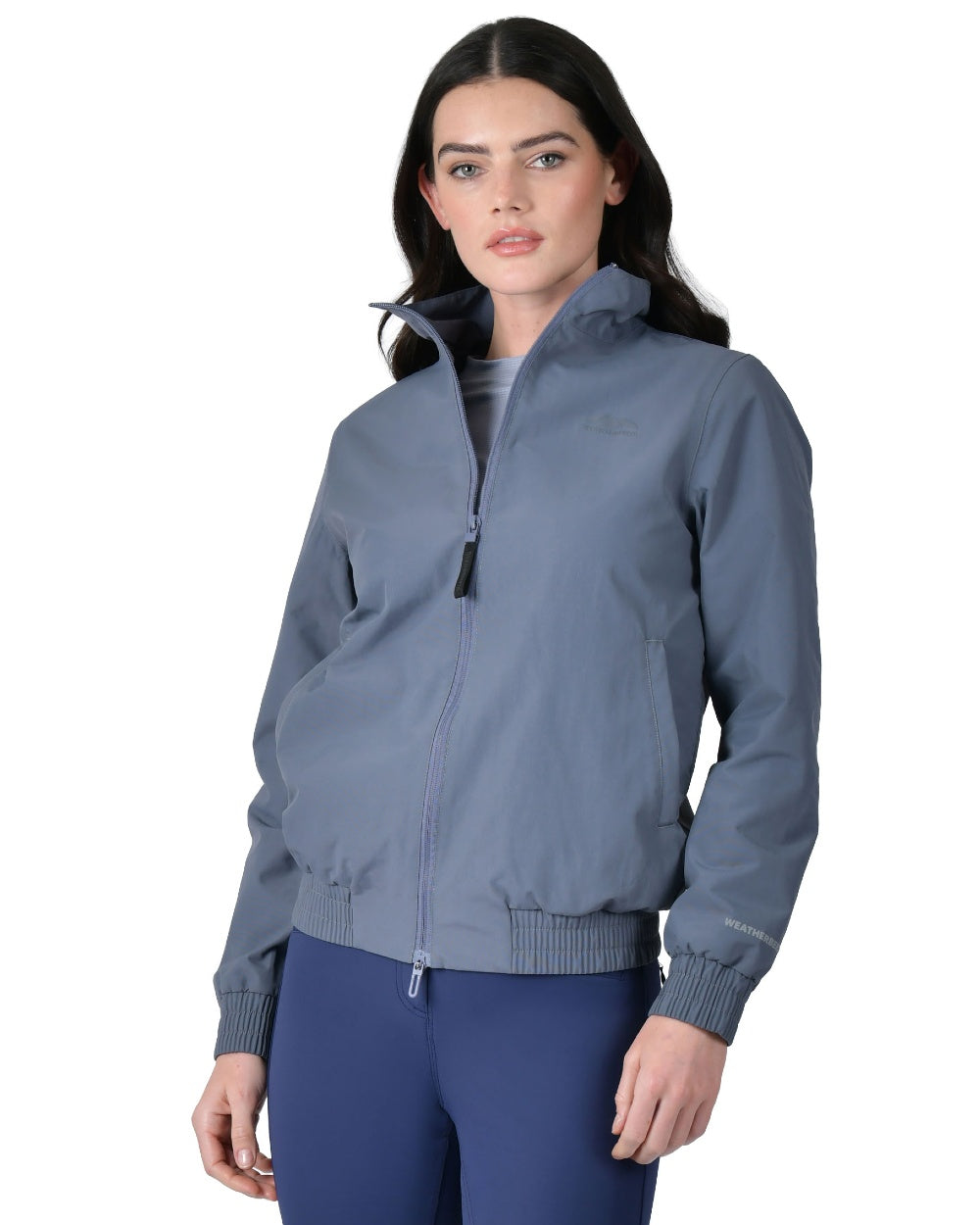 Slate Blue coloured WeatherBeeta Womens Waterproof Team Jacket on white background 