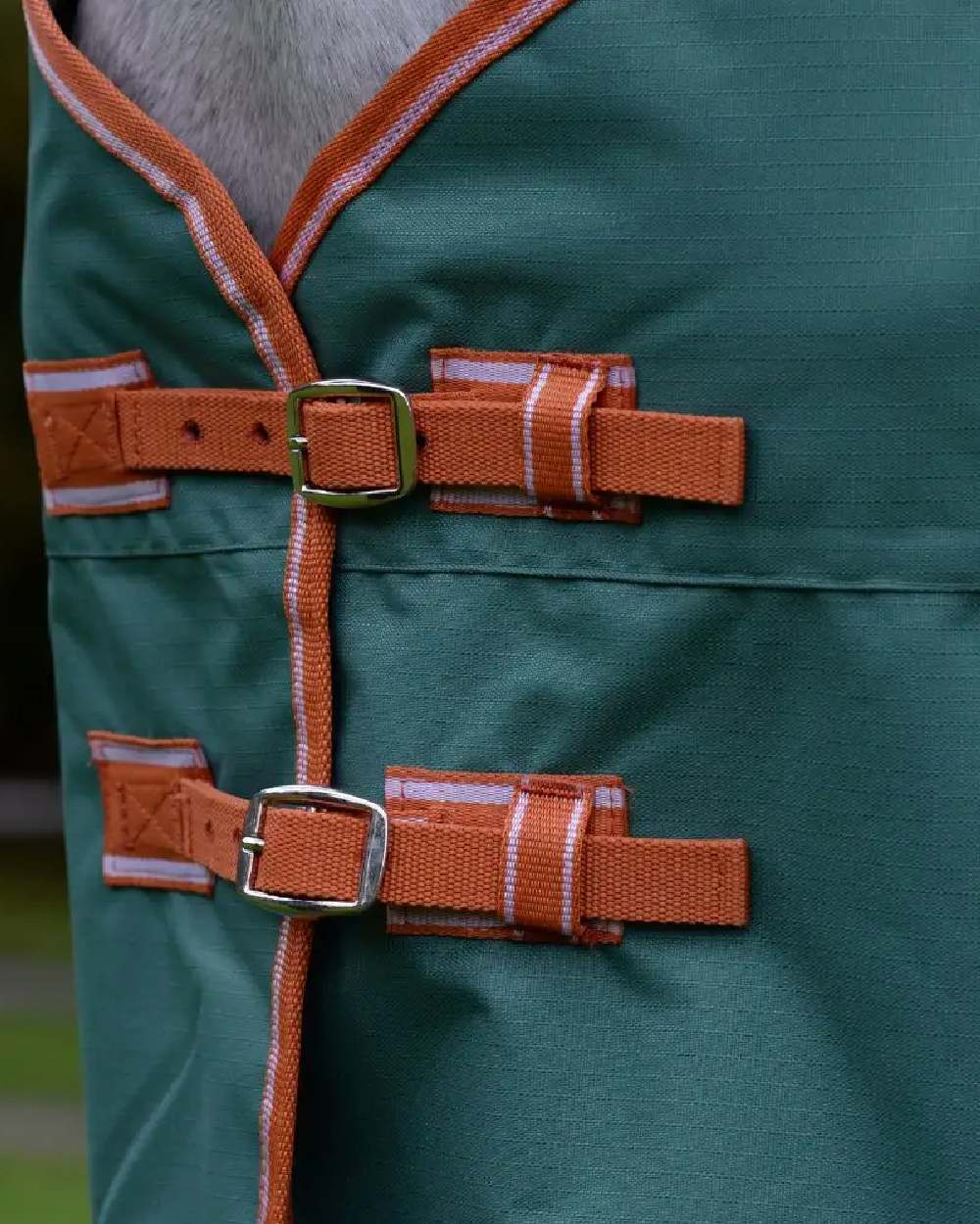 Green Burnt Orange White coloured Weatherbeeta ComFiTec Tyro Standard Neck Medium on blurry background 