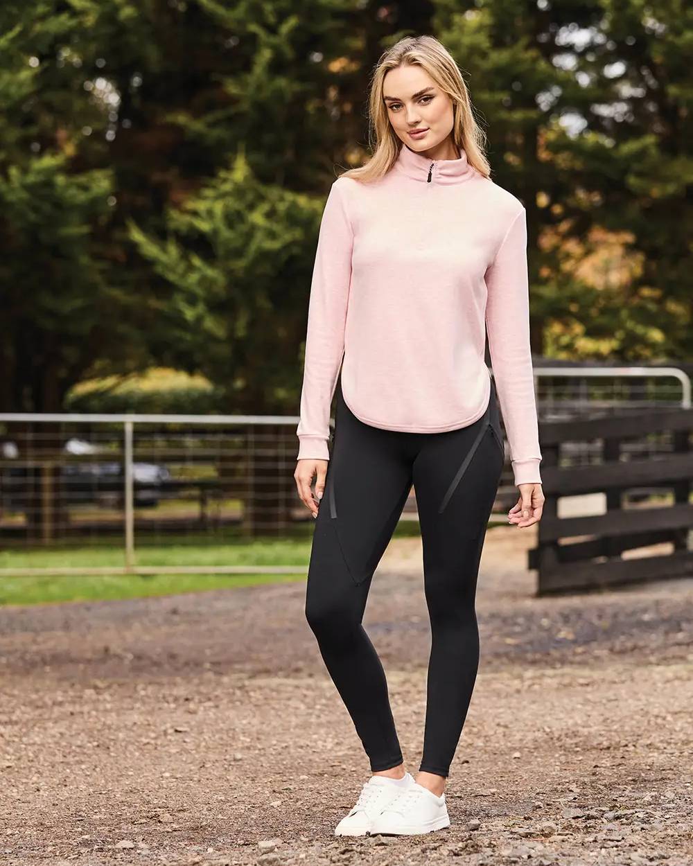 Blush Coloured WeatherBeeta London Layer Long Sleeve Top On A blurry Background 