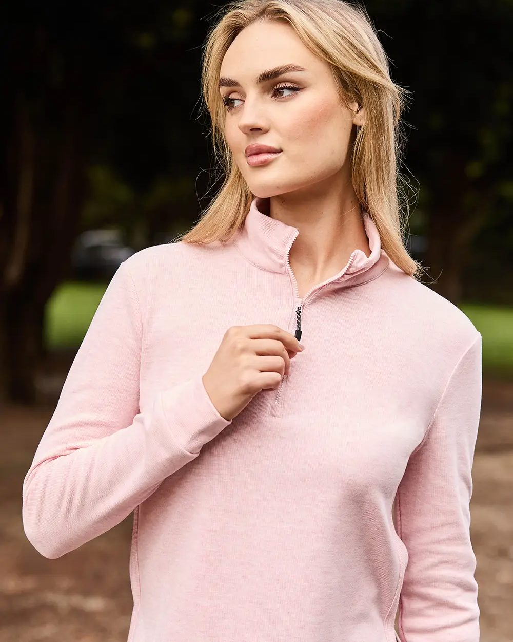 Blush Coloured WeatherBeeta London Layer Long Sleeve Top On A blurry Background 