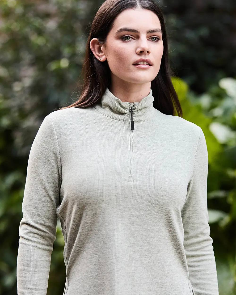 Dusty Olive Coloured WeatherBeeta London Layer Long Sleeve Top On A blurry Background 