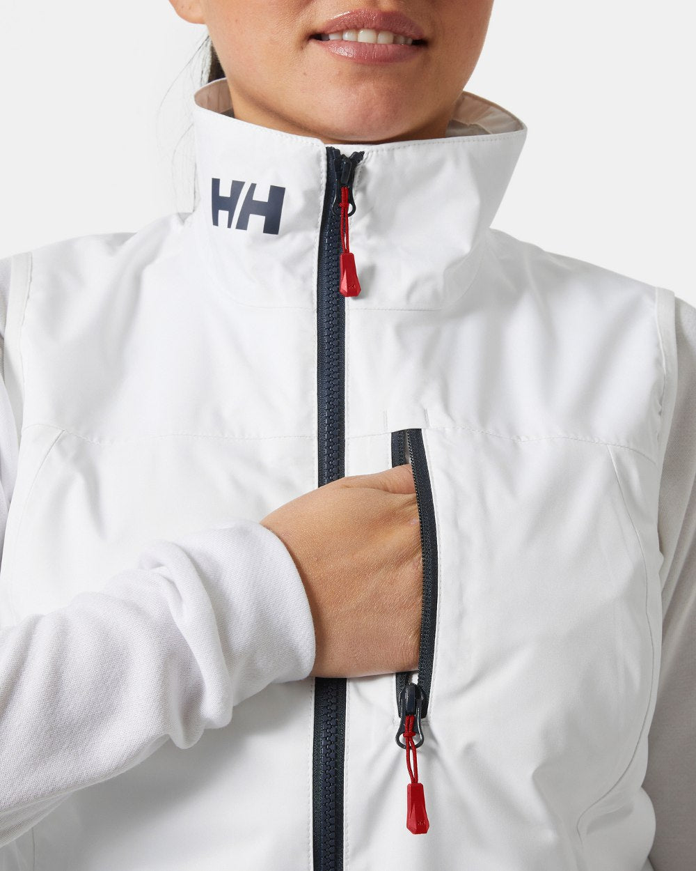 White coloured Helly Hansen Womens Crew Sailing Vest 2.0 on grey background 