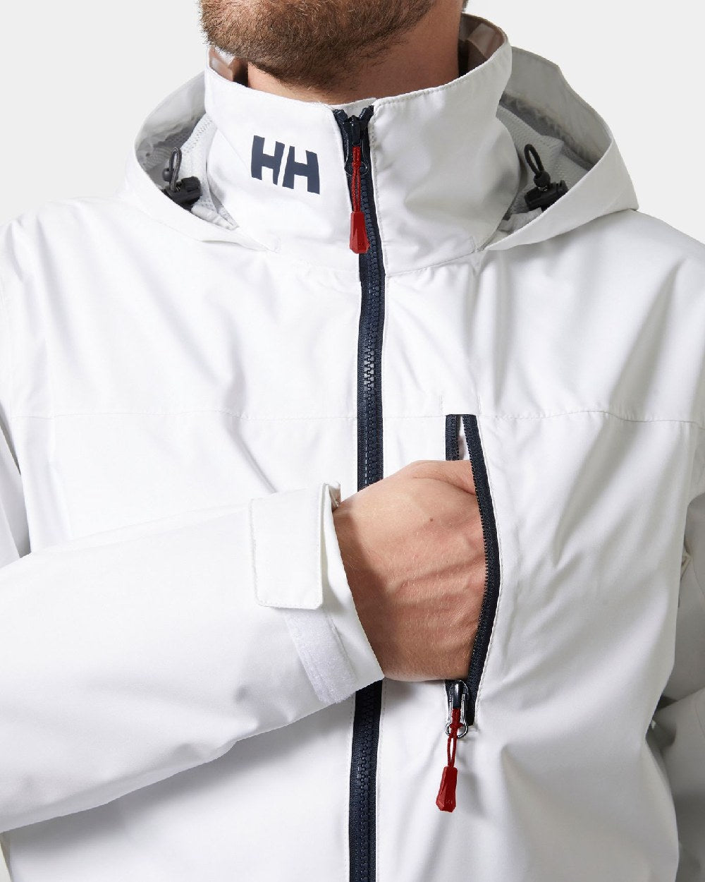 White coloured Helly Hansen Mens Crew Hooded Jacket 2.0 on grey background 