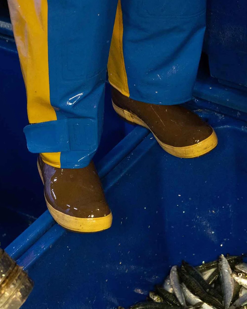 Copper-Tan Coloured Xtratuf 15&quot; Legacy Plain Toe Fishing Boots on outdoor background 