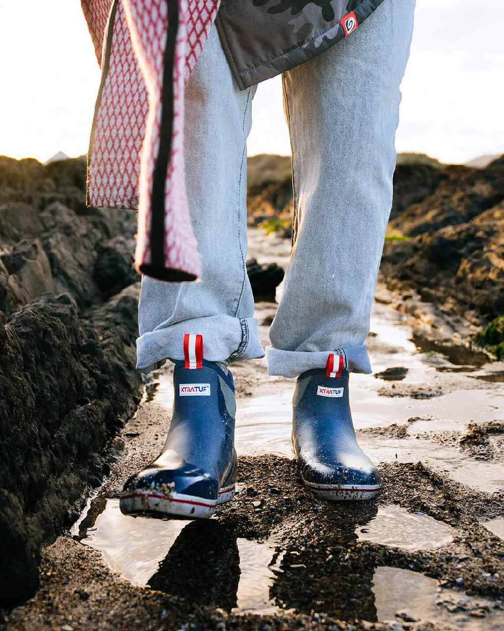 Navy Red Coloured Xtratuf Mens 6 Ankle Deck Boots on outdoor background 