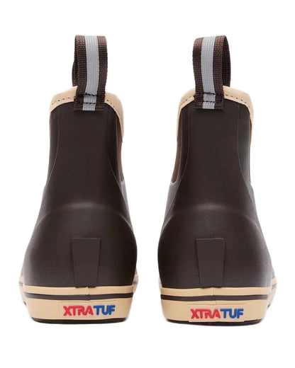 Brown Coloured Xtratuf Womens 6&quot; Ankle Deck Boots on outdoor  background 