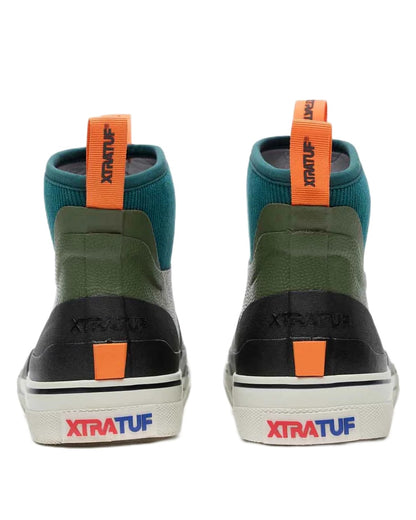 Green coloured Xtratuf mens Out Of The Ordinary Deck Boots on whit e background 
