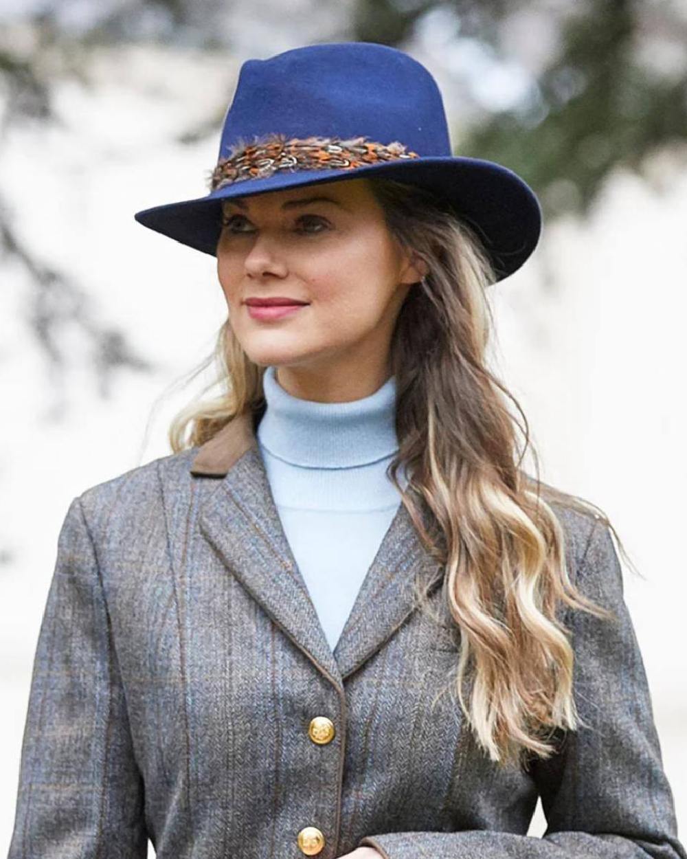 Blue Coloured Alan Paine Richmond Ladies Fedora On A Street Background 