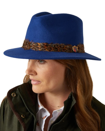 Blue Coloured Alan Paine Richmond Ladies Fedora On A White Background 