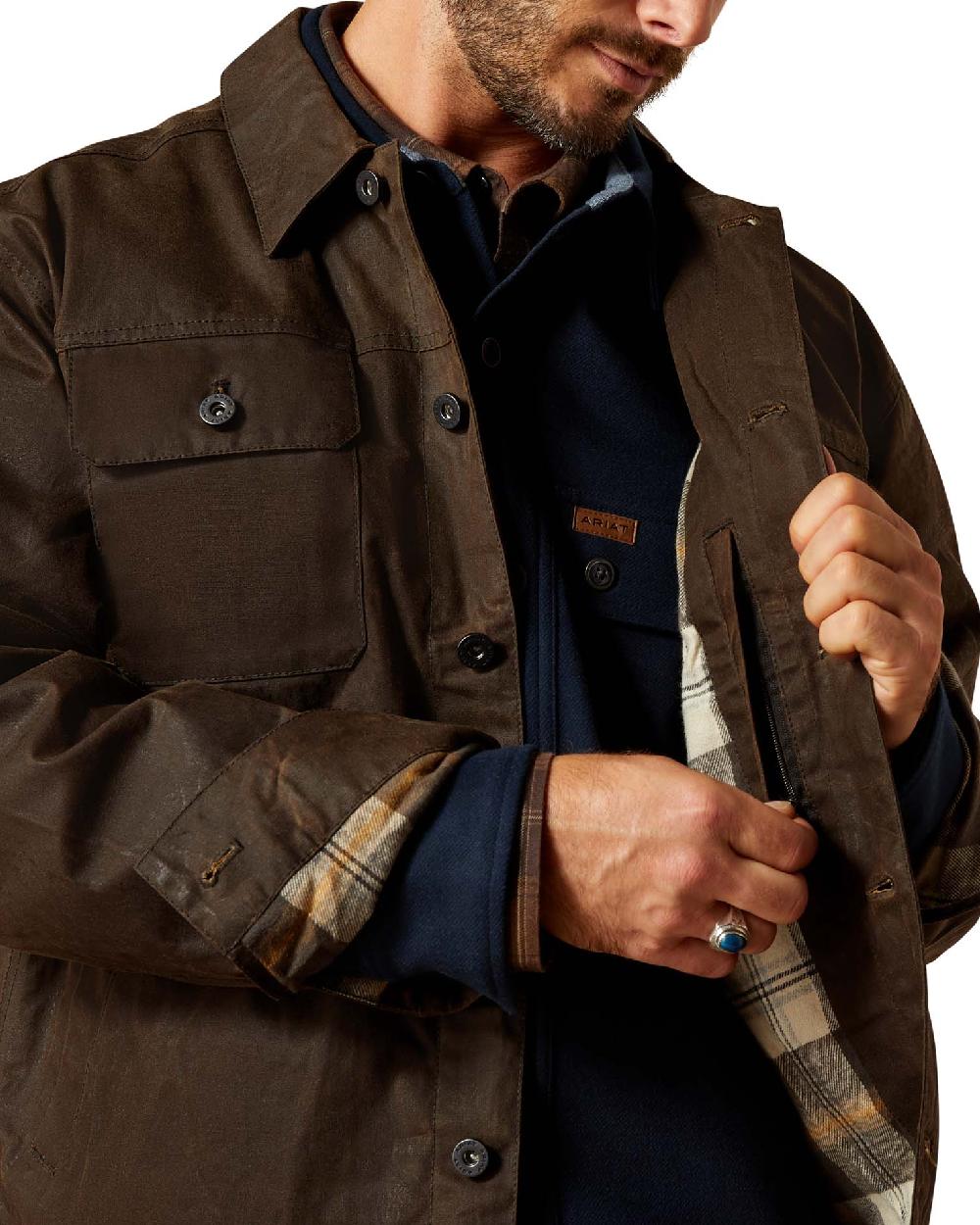 Brown coloured Ariat Mens Drayham Jacket on white background 