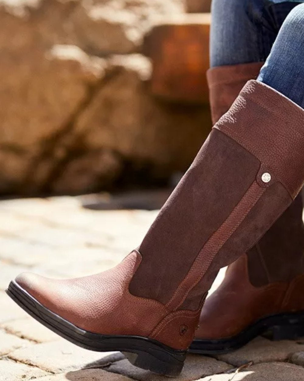 Dark Brown Coloured Ariat Windermere II Waterproof Boots On A Forest Background