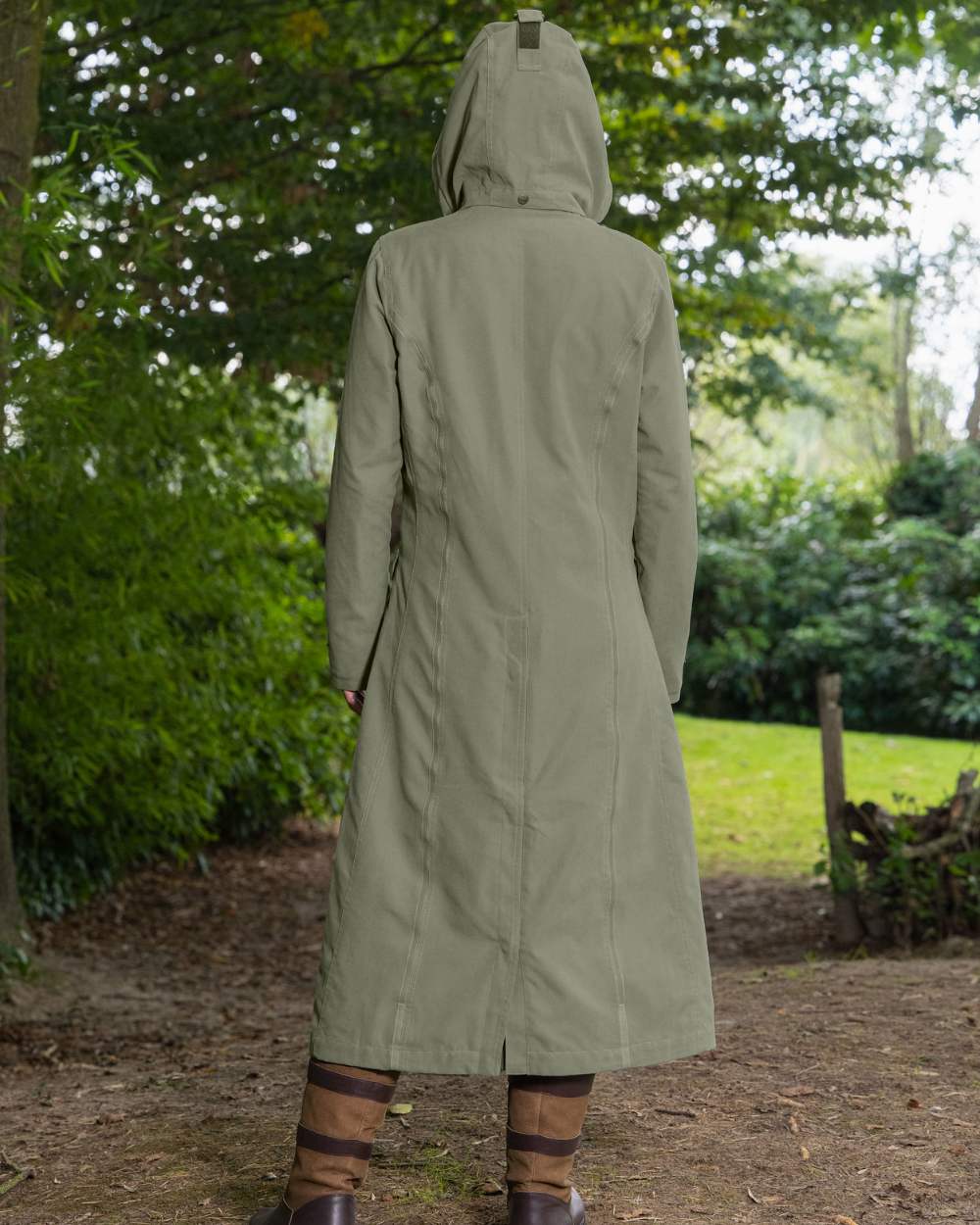 Grey Green Coloured Baleno Kensington Safe Womens Long Riding Coat On A Backyard Background 