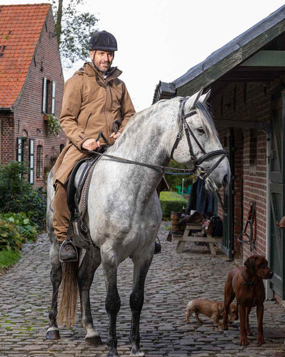 Camel Coloured Baleno Livingstone Long Waterproof Coat On A Street Background 