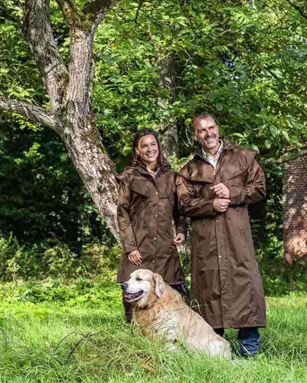 Brown Coloured Baleno Newbury Waterproof Long Coat On A Forest Background 