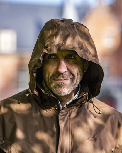 Brown Coloured Baleno Newbury Waterproof Long Coat On A Street Background 