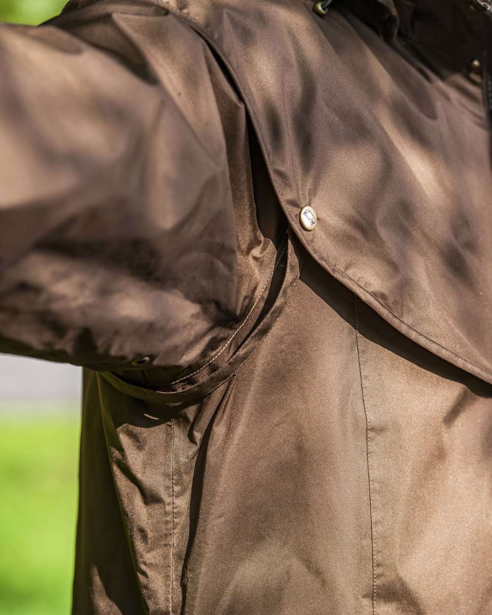 Brown Coloured Baleno Newbury Waterproof Long Coat On A Street Background 