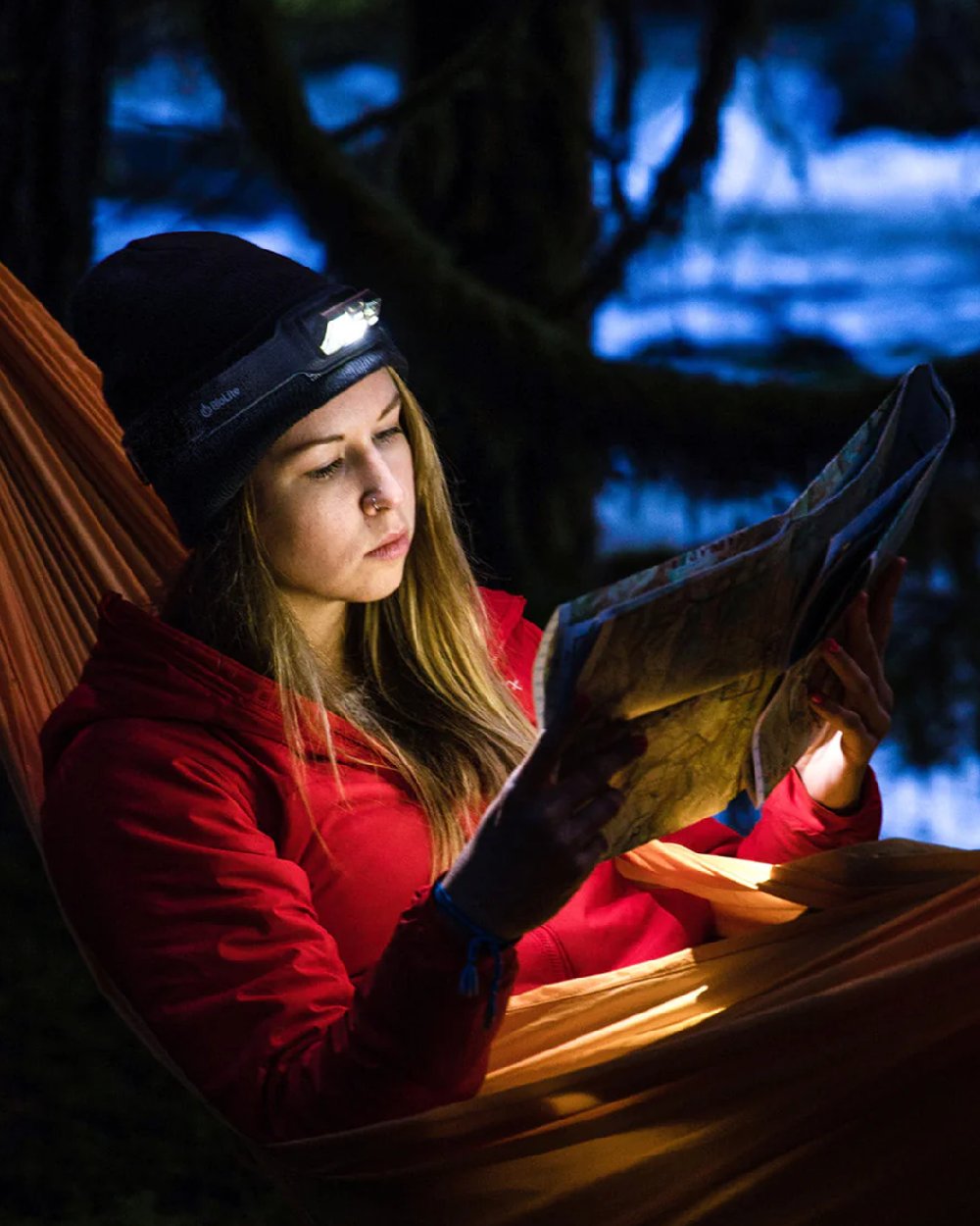 Midnight Grey Coloured BioLite Ultra-lightweight USB Headlamp 325 On A Forest Background 