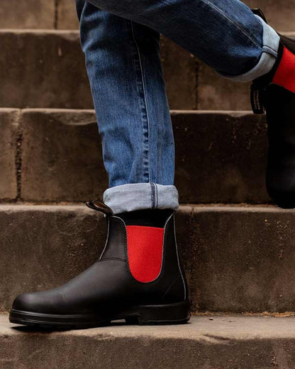 Black Red Coloured Blundstone 508 Black Red Chelsea Boots On A Stairs Background