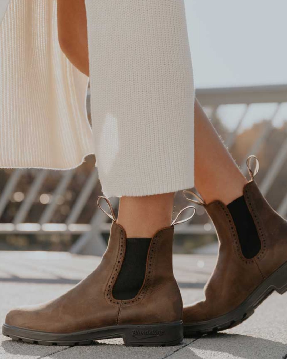 Antique Brown Coloured Blundstone Womens 2151 Antique Brown Leather Chelsea Boots On A Over Bridge Background