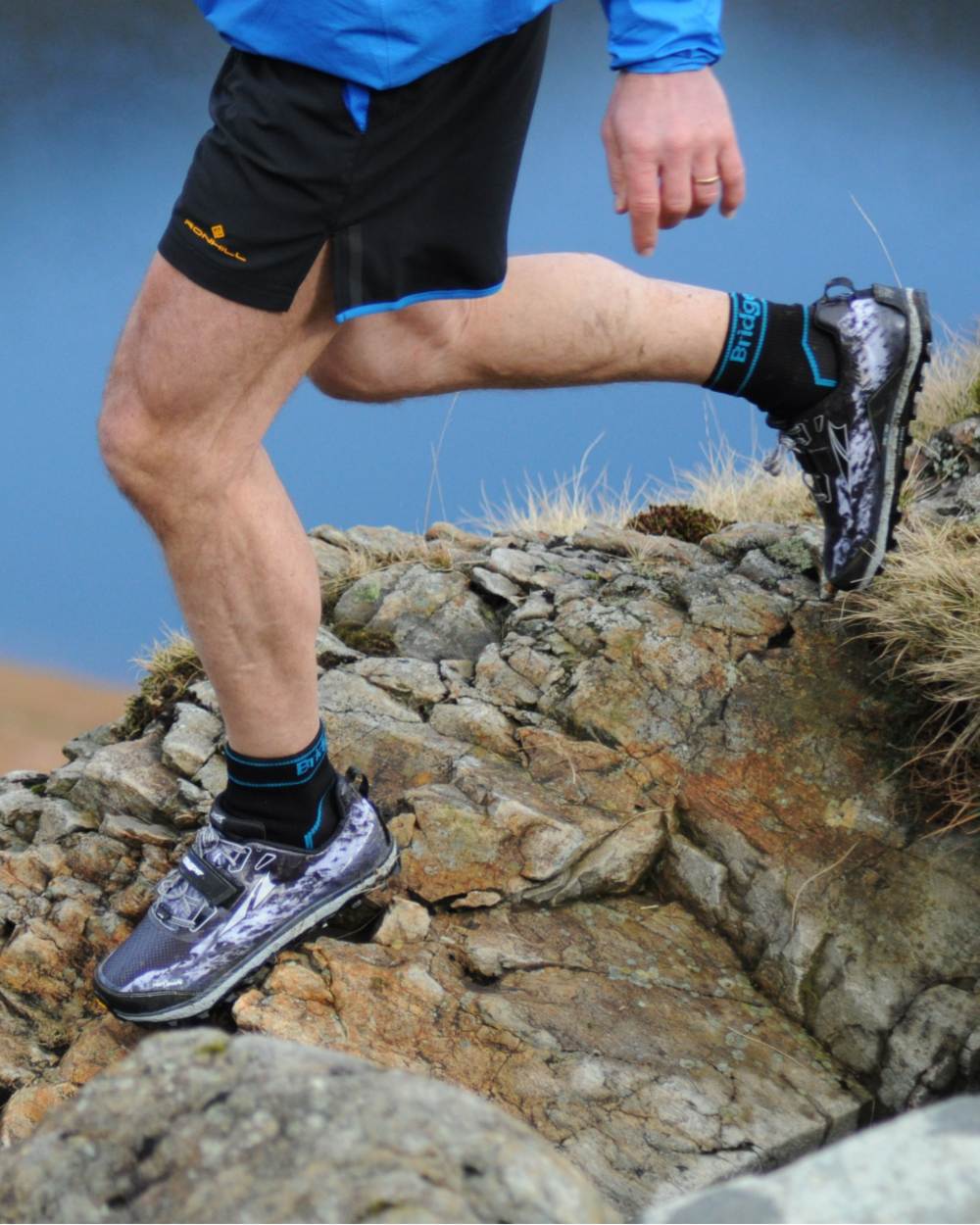 Black Coloured Bridgedale StormSock Midweight Boot Socks on Outdoor Background
