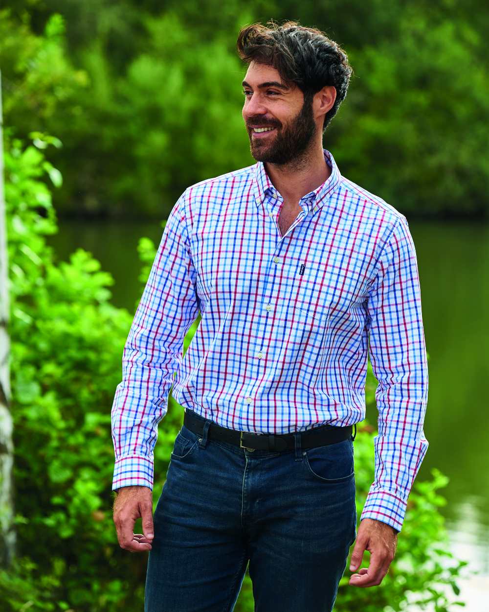 Blue Coloured Champion Harrogate Long Sleeve Shirt On A Sea Background