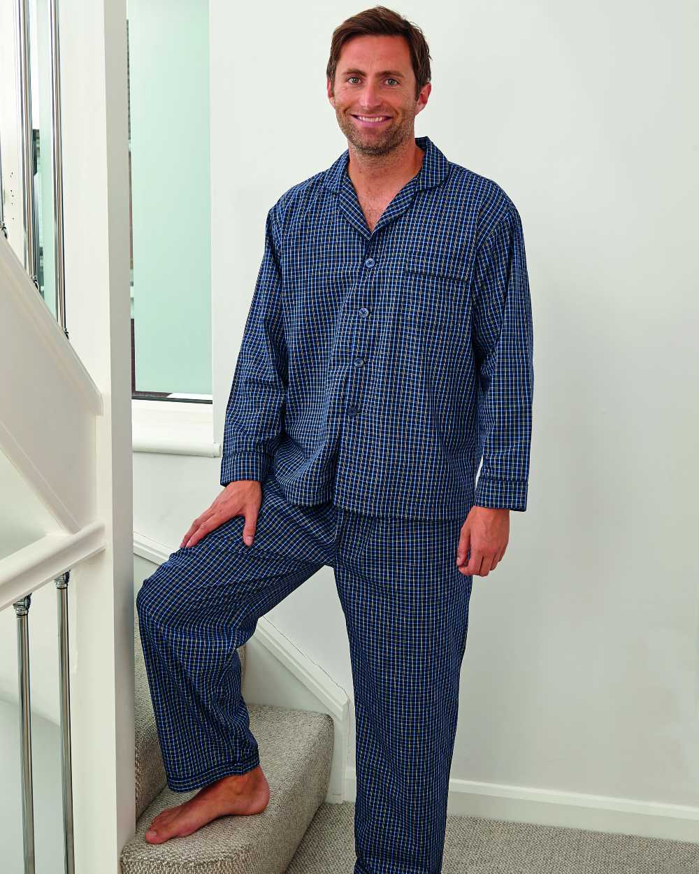 Navy Coloured Champion Marlow Pyjamas On A Stairs Background 