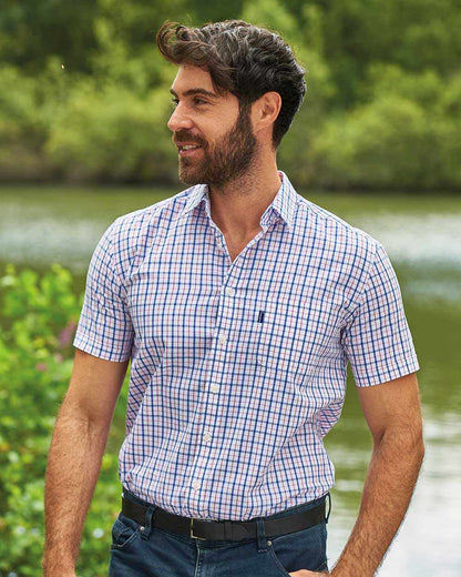 Red Coloured Champion Whitstable Short Sleeve Shirt On A Pond Background 