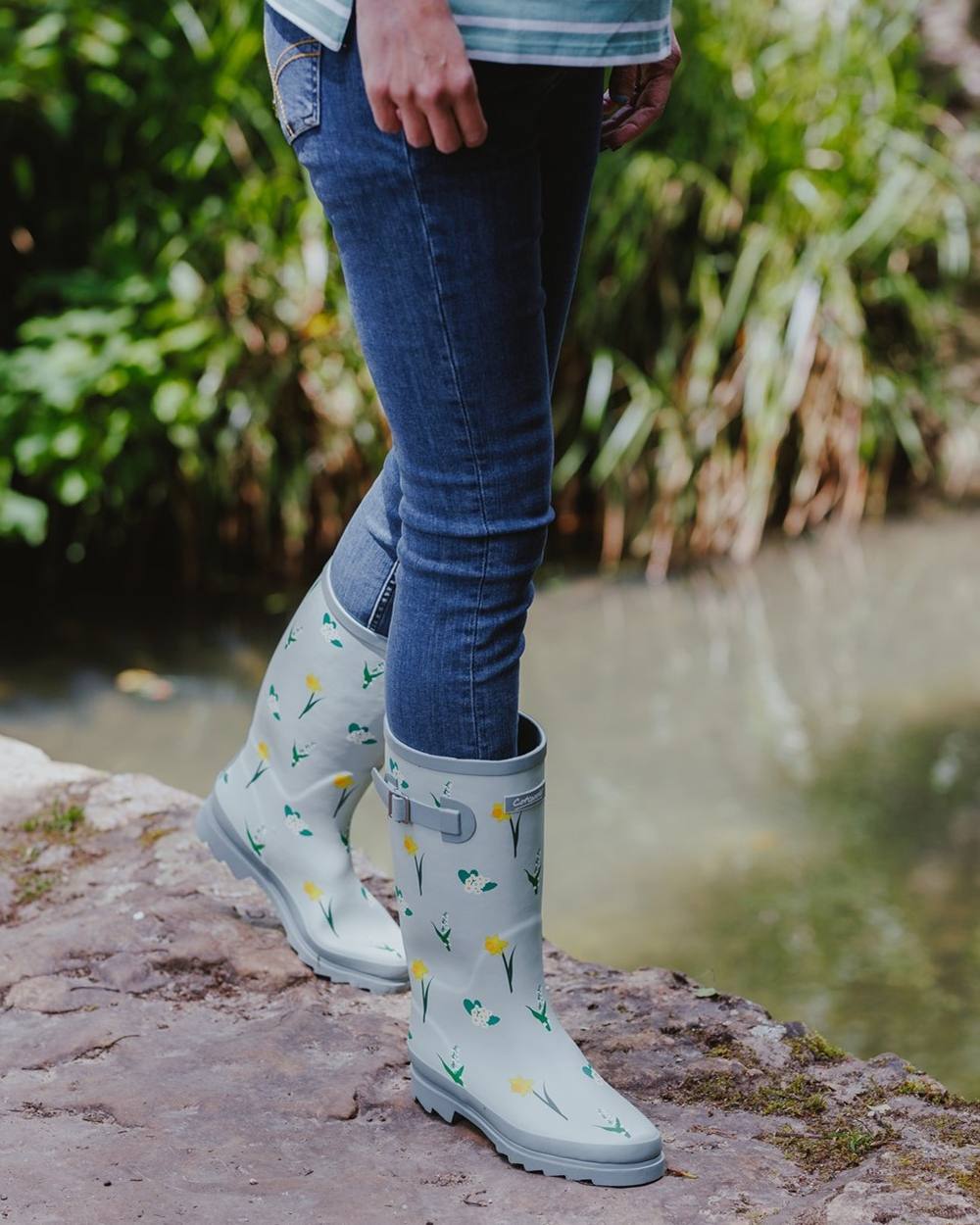 Mint Coloured Cotswold Womens Wildflower Tall Wellingtons on River Background
