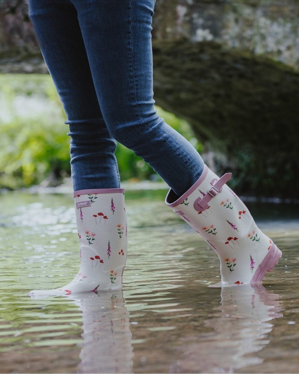 Pink Coloured Cotswold Womens Wildflower Tall Wellingtons on Outdoor Background

