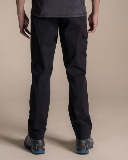 Black coloured Craghoppers Mens Brisk Pro Trouser on beige background 