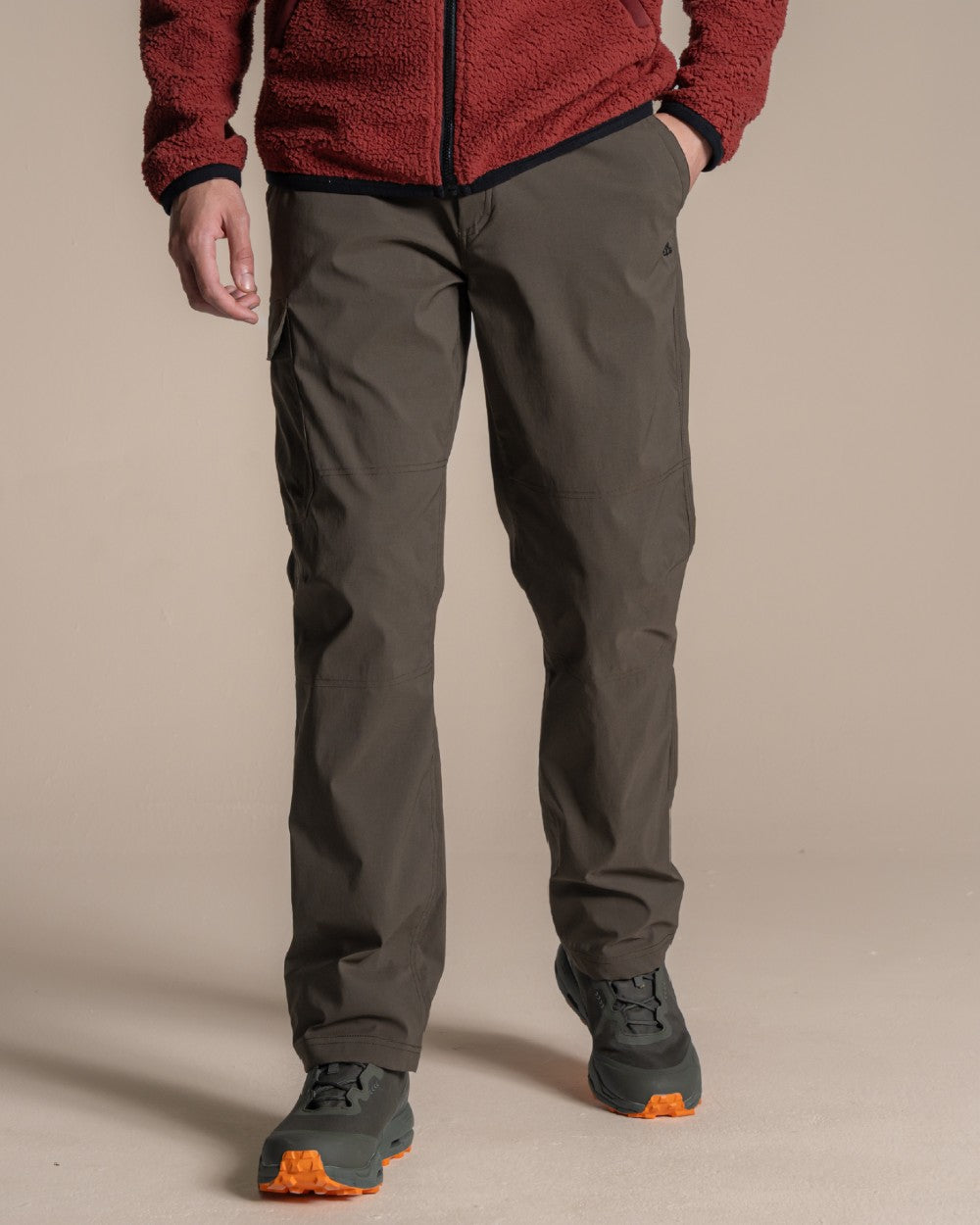 Woodland Green coloured Craghoppers Mens Brisk Pro Trouser on beige background 