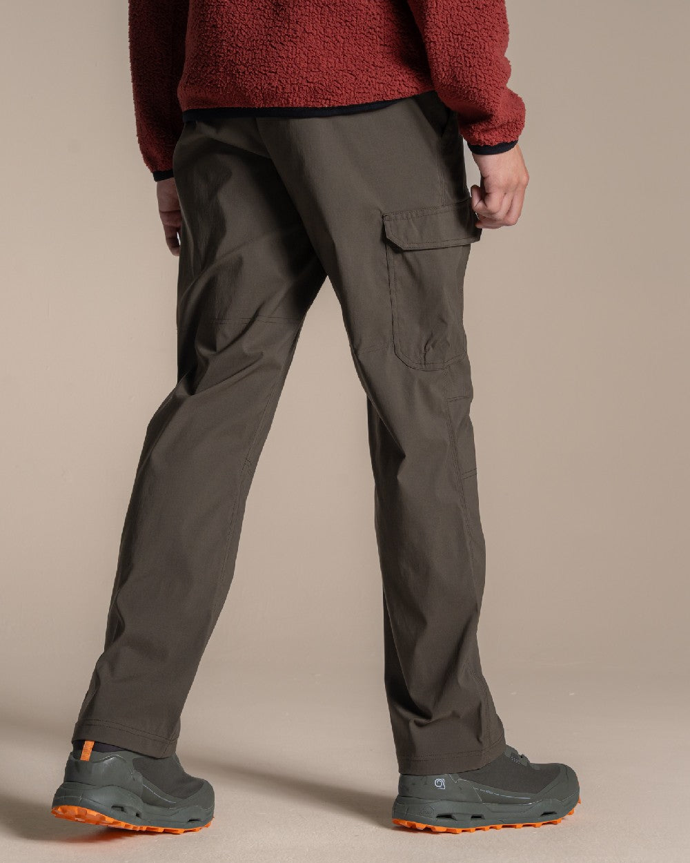 Woodland Green coloured Craghoppers Mens Brisk Pro Trouser on beige background 