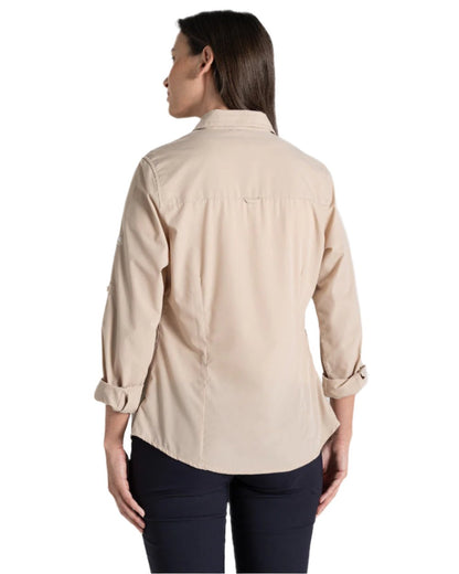 Desert Sand Coloured Craghoppers Womens Kiwi II Long Sleeved Shirt On A White Background 