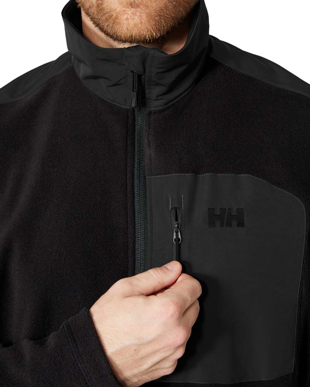 Black coloured Helly Hansen Fleece Jacket on White background 