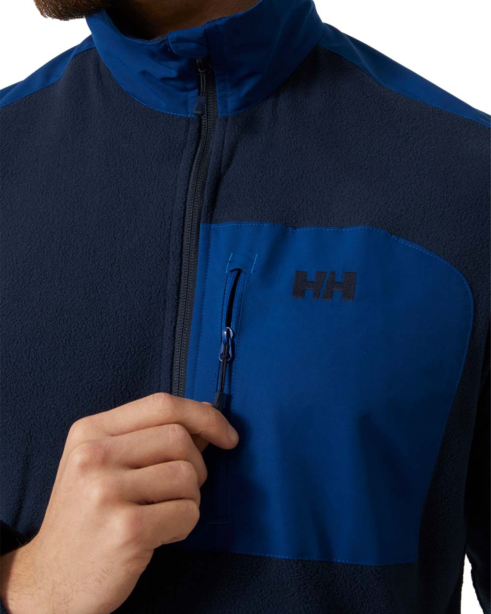 Navy coloured Helly Hansen Fleece Jacket on White background 